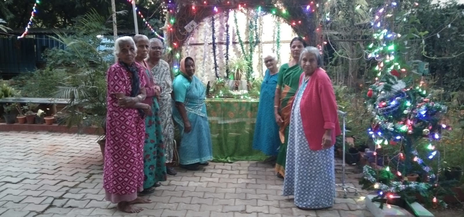 Sisters and Residents Build Christmas Crib